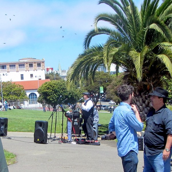 Paul Coca witnessing at Dolores Park while James Croci sings.